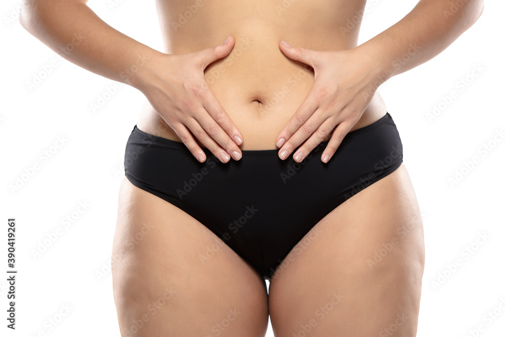 Love herself. Overweight woman with fat cellulite legs and buttocks, obesity female body in black underwear isolated on white background. Orange peel skin, liposuction, healthcare and beauty treatment Love herself. Overweight woman with fat cellulite legs and buttocks, obesity female body in black underwear isolated on white background. Orange peel skin, liposuction, healthcare and beauty treatment