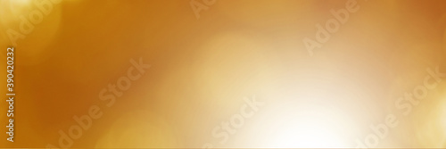 Gold and golden yellow light leaves blurred and blur natural abstract. Effect sunlight soft bright shiny style bokeh circle yellow and orange blurry morning . For wallpaper backdrop and background. 