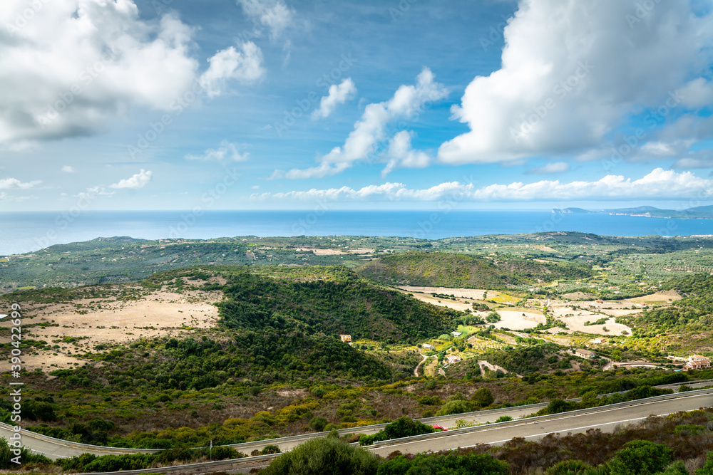 Obraz premium Clouds over Sardinia coastline in fall
