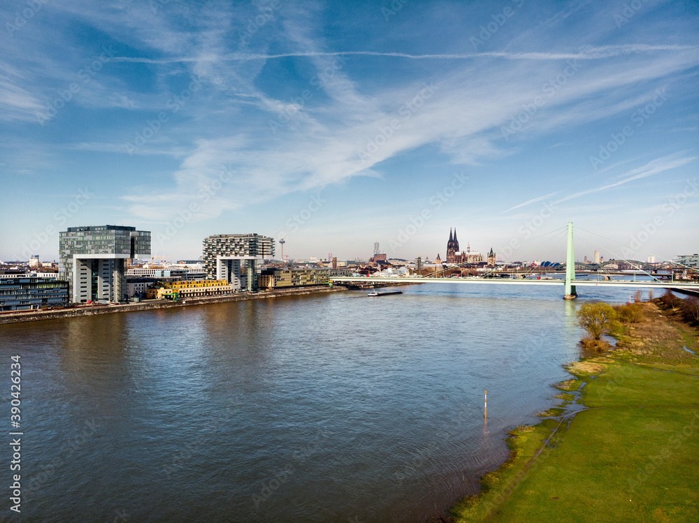 Naklejka premium Drone view on the modern architecture of Cologne with Cathedral in background.