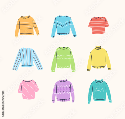 Set of different sweaters, jumpers, t-shirts, blouses, turtlenecks. Stylish clothes with various decorations. Vector hand drawn illustration. 