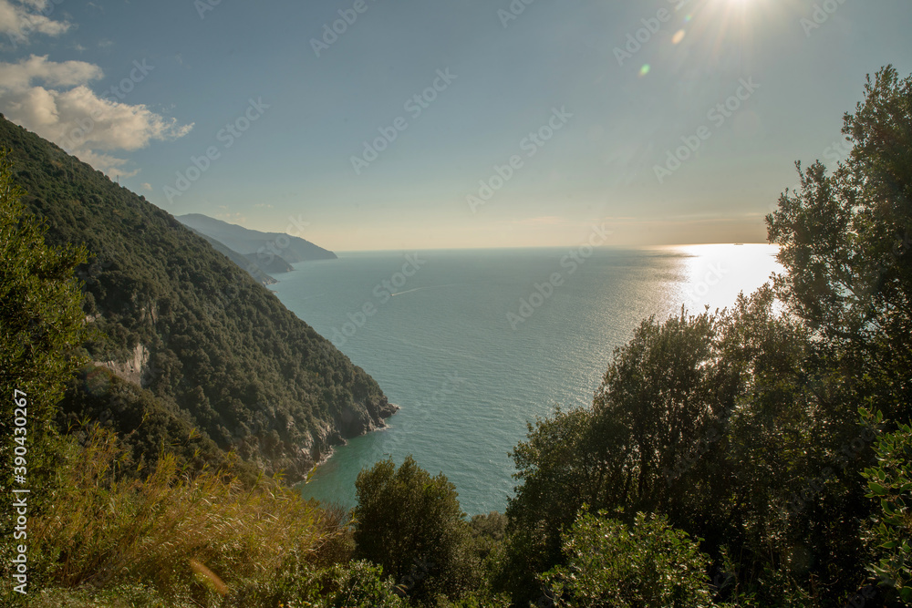 Fantastic view on Ligurian Coast- -  mountains  and speed boat in ewater of Mediterranean Sea