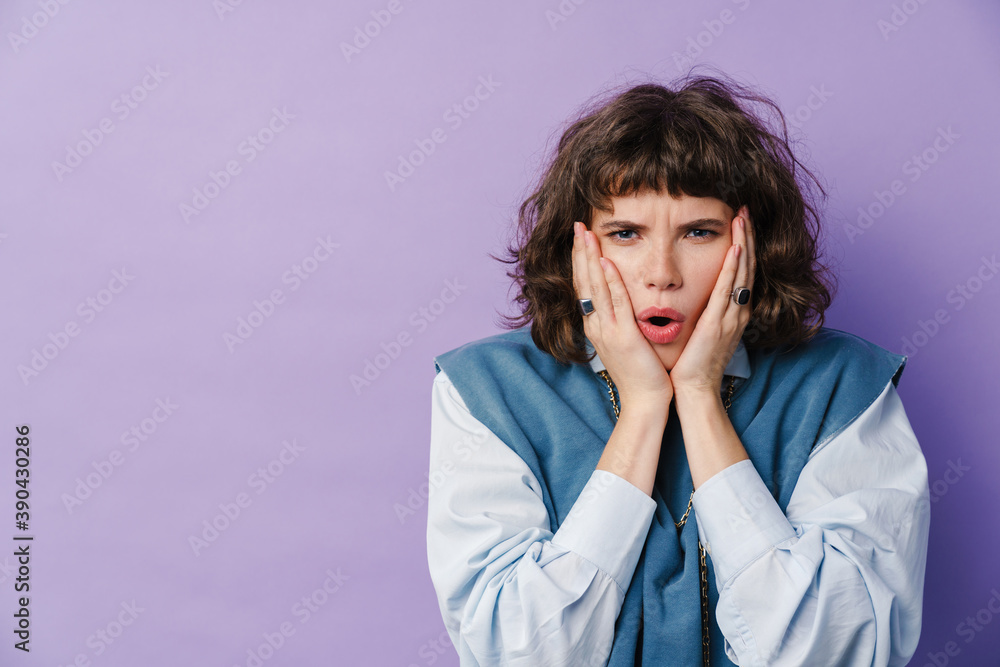 Caucasian shocked girl expressing surprise on camera Caucasian shocked girl expressing surprise on camera