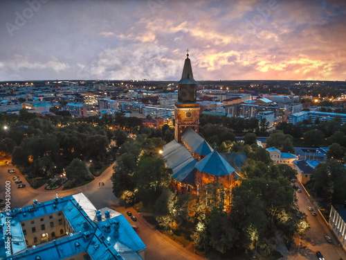 Fotografie Dramatic Skyline Aerial Over Turku Cathedral During Sunset