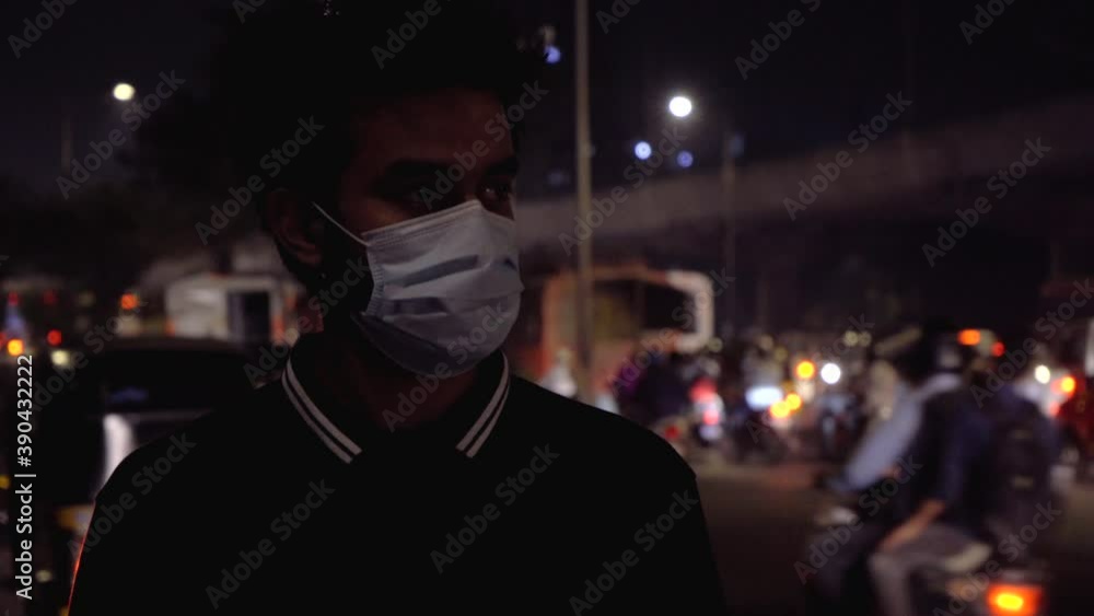 western express highway man looking at traffic with a mask on new normal Indian Mumbai western express highway western express highway man looking at traffic with a mask on new normal Indian Mumbai western express highway