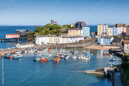 Tenby Harbour which is a popular seaside resort town in Pembrokeshire South Wales and a popular travel destination tourist attraction landmark, stock photo image photo