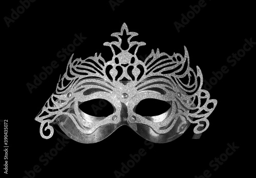 silver carnival mask, front view, on black background