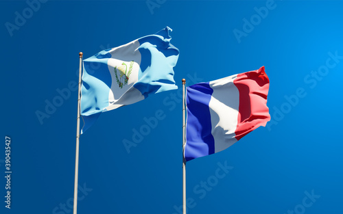 Beautiful national state flags of Guatemala and France together at the sky background. 3D artwork concept.