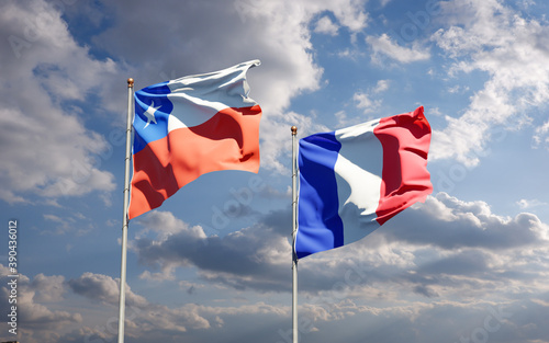Beautiful national state flags of Chile and France together at the sky background. 3D artwork concept.