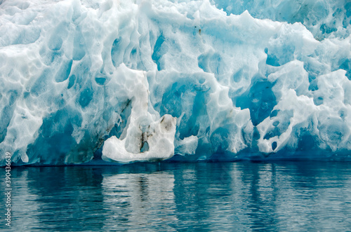 Detail of the bluish ice of an iceberg