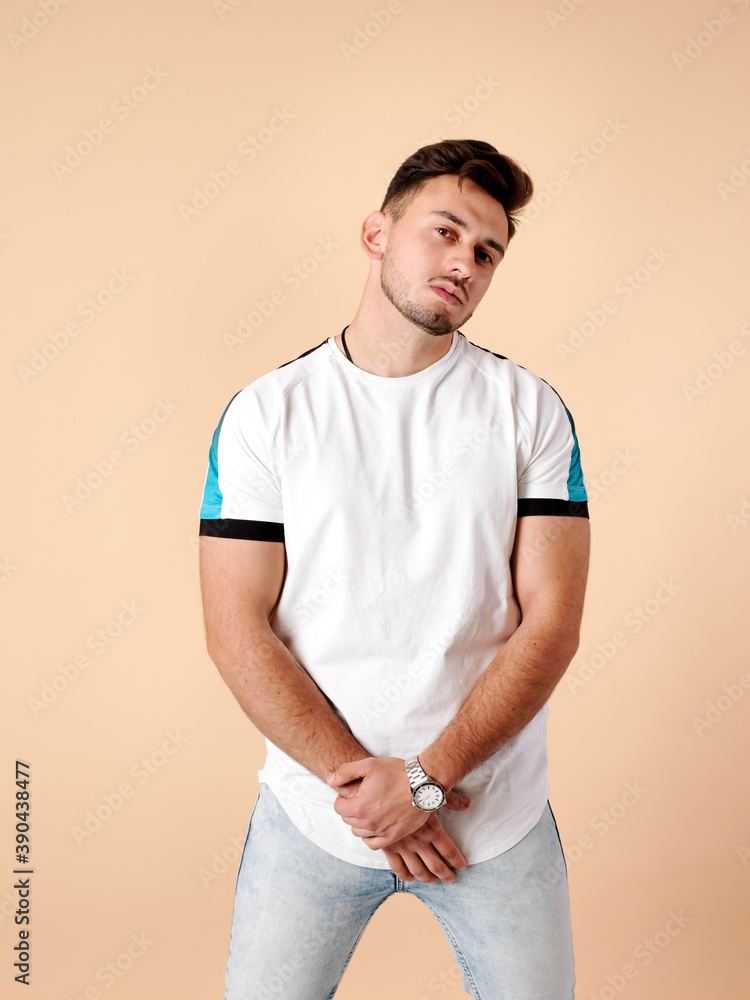 Young man with serious fitness and self-confidence Young man with serious fitness and self-confidence