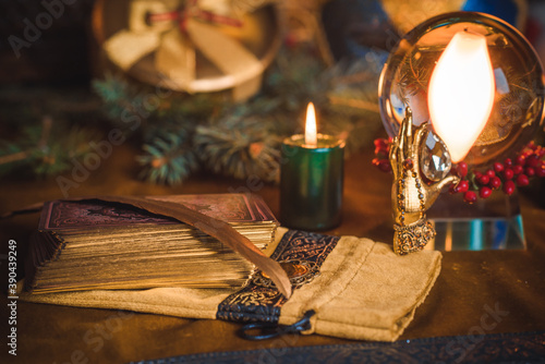 Concept of Christmas divination predictions on tarot cards, magical ball and other magic