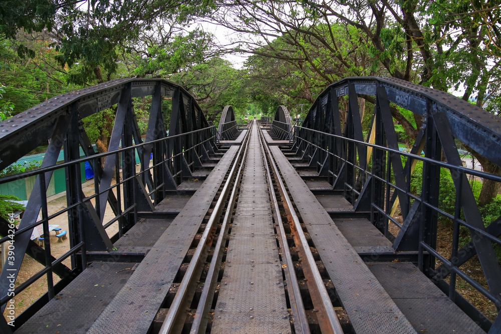 The old railway line on the wooden bridge over the River Kwai