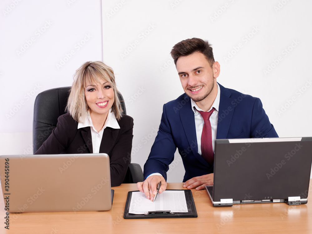 Business staff with positive aptitude working at their position Business staff with positive aptitude working at their position