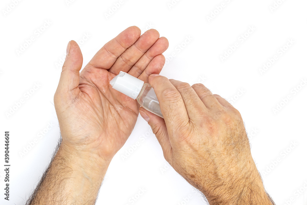 Hands of a man applying alcohol gel to make cleaning and clear germ, bacteria, Health care concept Hands of a man applying alcohol gel to make cleaning and clear germ, bacteria, Health care concept