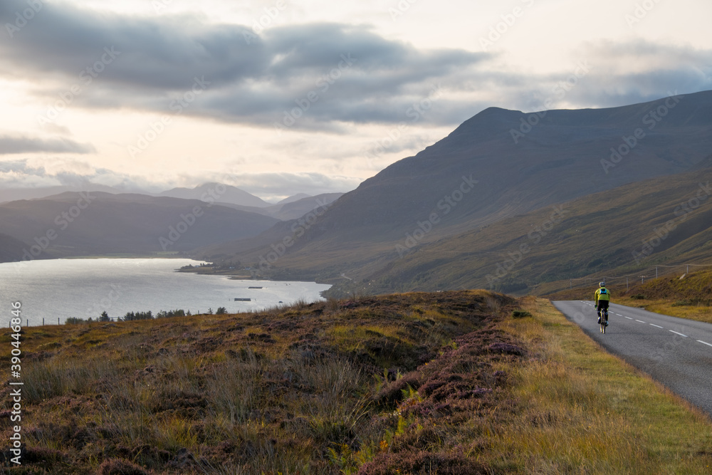 landscape & cyclist in the Scottish mountains