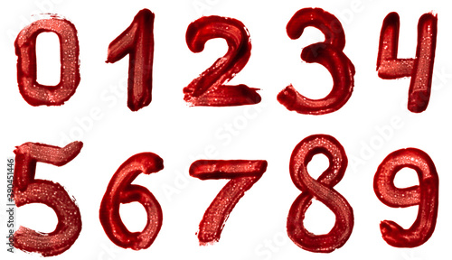 Set of numbers is drawn in red paint bloody isolated on a white background.