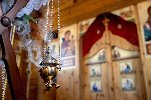 smoking censer against the altar