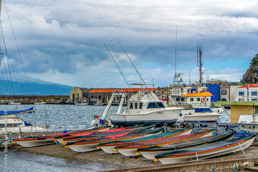 Portugal, Azores, Island of Faial, in the city of Horta fisher boats in the port. Portugal, Azores, Island of Faial, in the city of Horta fisher boats in the port.