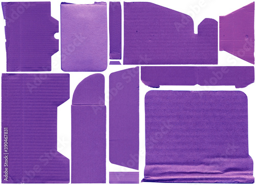 Close up of a violet vintage torn sheet of carton. Cardboard paper texture with a blank background. Empty papercraft surface. Isolated shape and element. photo