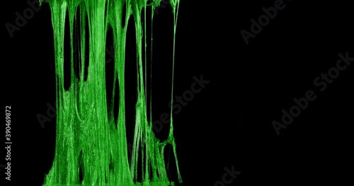Green Slime Dripping In Black Background 