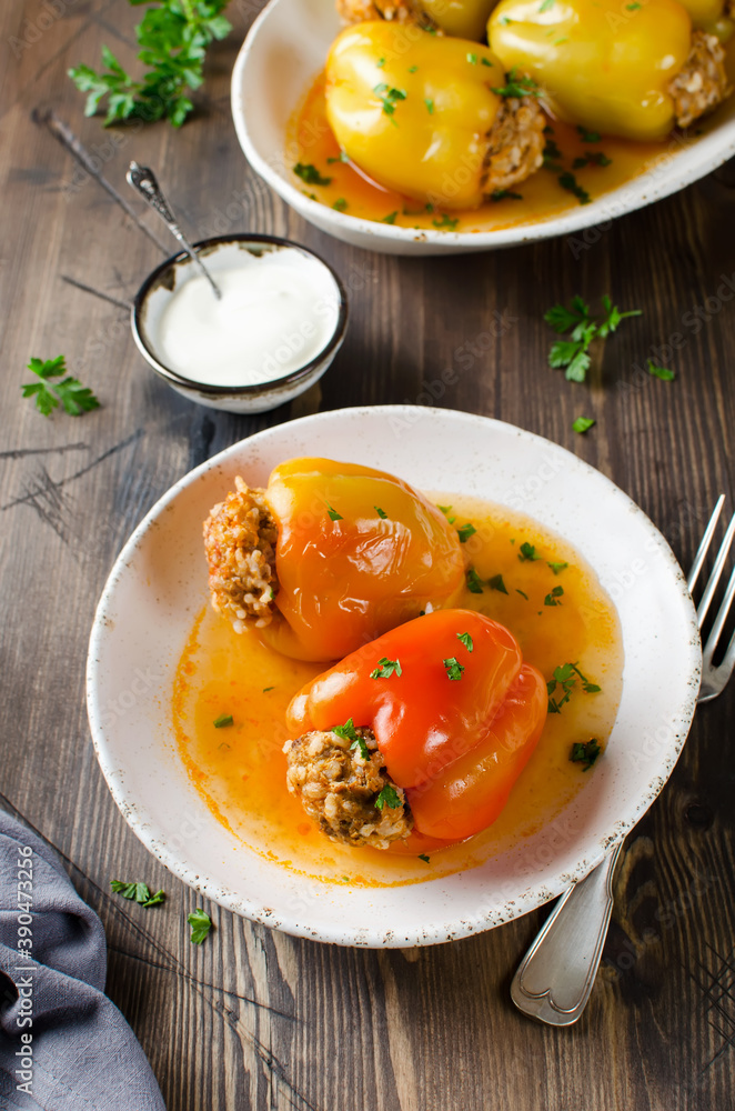 Stuffed peppers with ground meat and rice in tomato sauce Stuffed peppers with ground meat and rice in tomato sauce