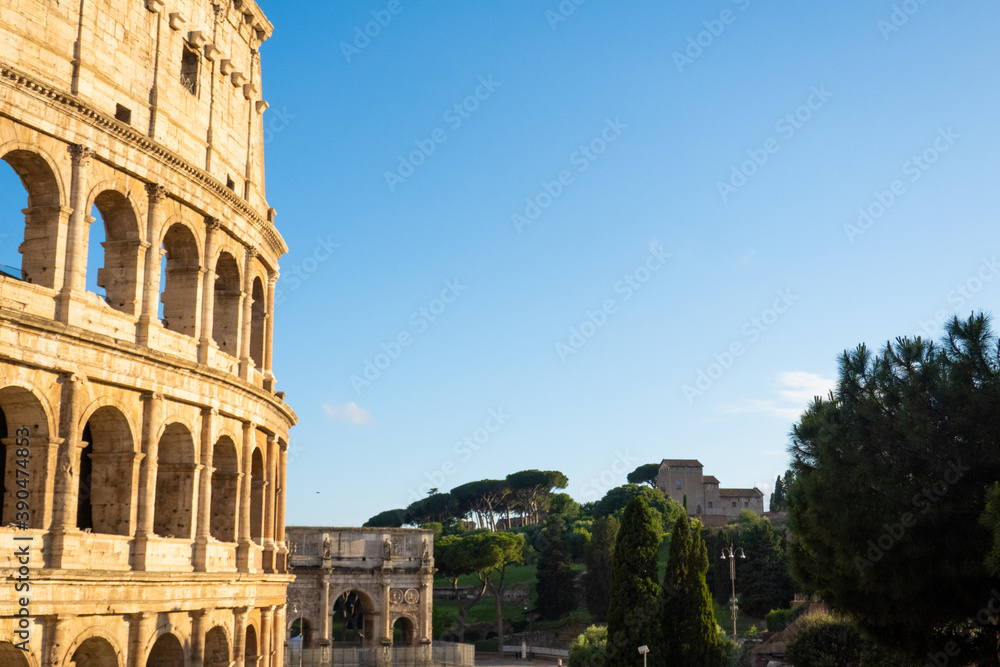 Close up of colloseum Rome, blue skies, golden yellow, history, momunemt, roman empire no people