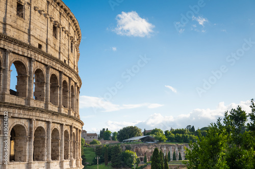 Close up of colloseum Rome, blue skies, golden yellow, history, momunemt, roman empire no people