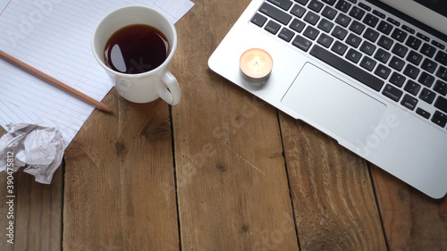 Rustic Writing Workspace | Cozy Writing Space | Writing Paper and Pencil with a Cup of Coffee and Laptop on a Wooden Background | 