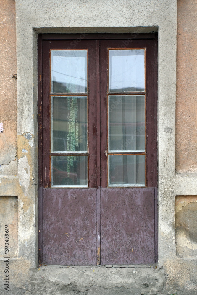 beautiful old street wooden door with windows