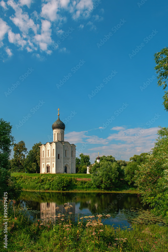 Church of the Intercession of the blessed virgin on the Nerl in summer. Built in the 12th century. Bogolyubovo, Vladimir region, Tourist Golden ring of Russia Church of the Intercession of the blessed virgin on the Nerl in summer. Built in the 12th century. Bogolyubovo, Vladimir region, Tourist Golden ring of Russia