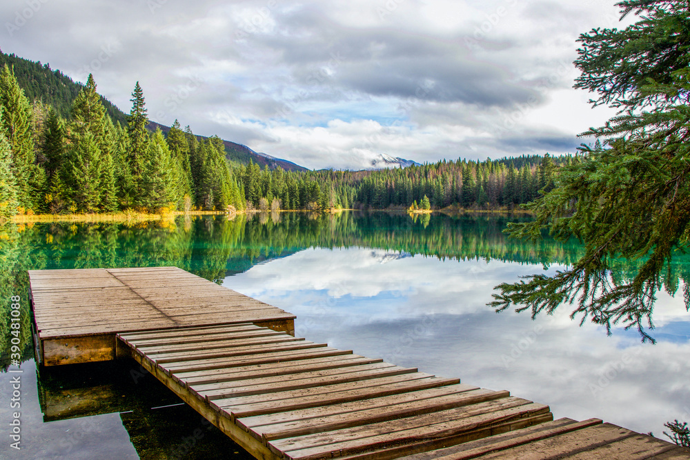 wooden dock on lake at Valley of the Five Lakes, Jasper National Park, Alberta, Canada wooden dock on lake at Valley of the Five Lakes, Jasper National Park, Alberta, Canada