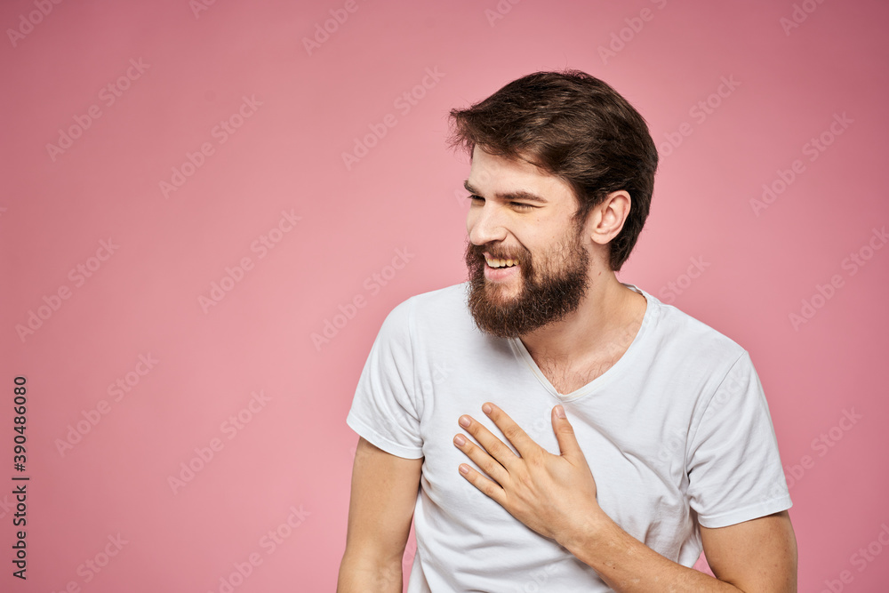 man in white t-shirt gesturing with his hands emotions fun pink background man in white t-shirt gesturing with his hands emotions fun pink background