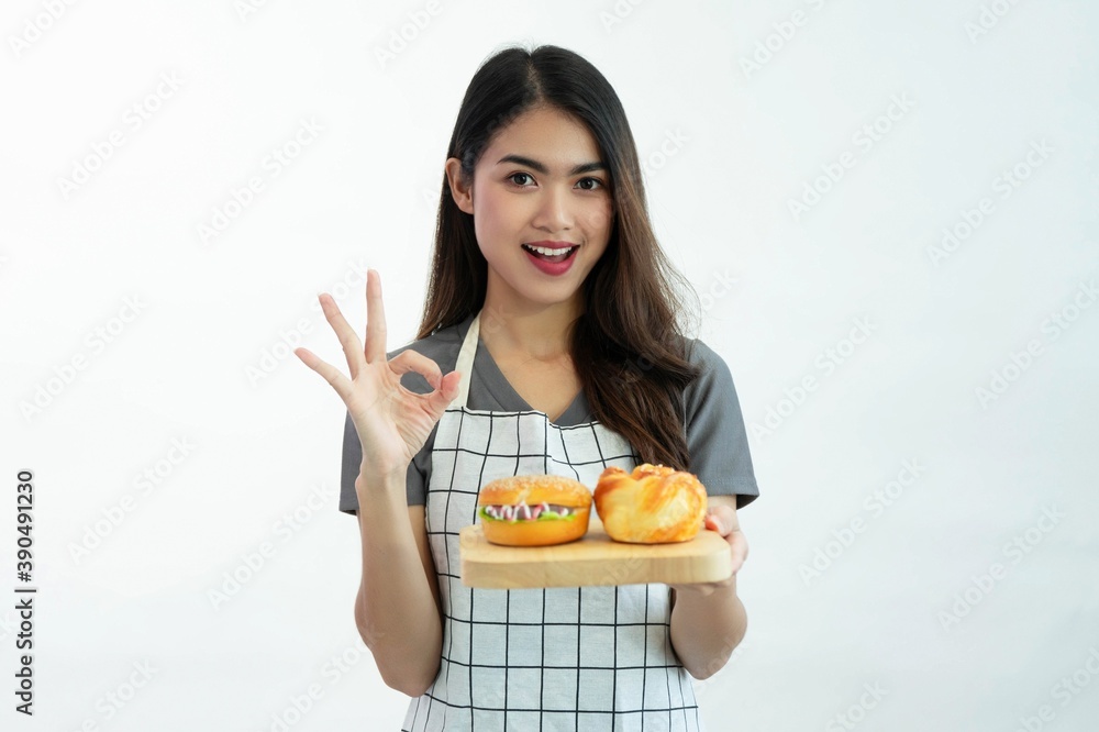 Young woman hand holding hamburger on white background Young woman hand holding hamburger on white background