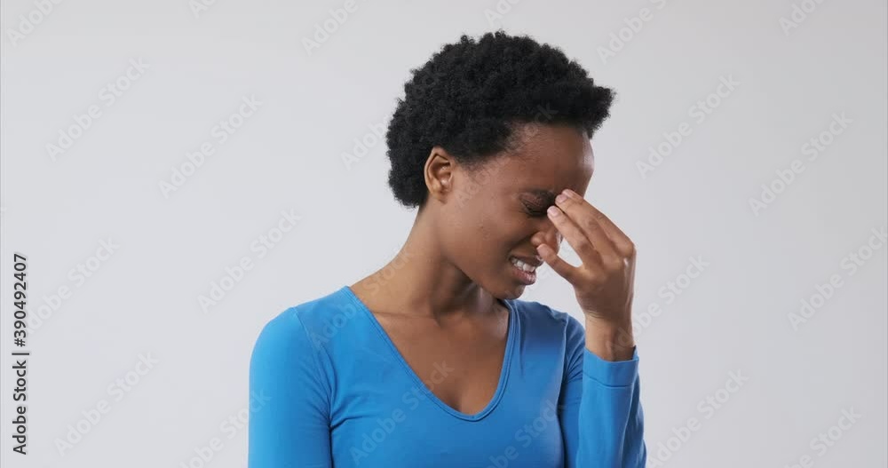 African american woman suffering from severe headache African american woman suffering from severe headache