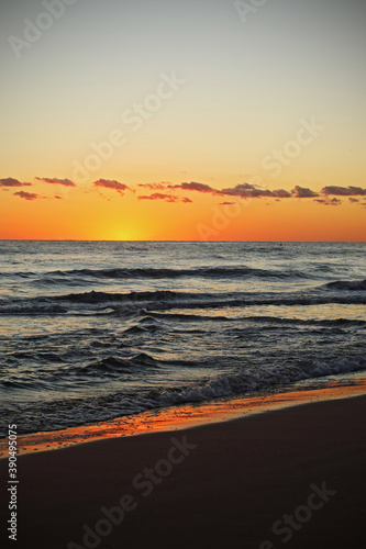 A golden sunrise on the beach  Mediterranean sea