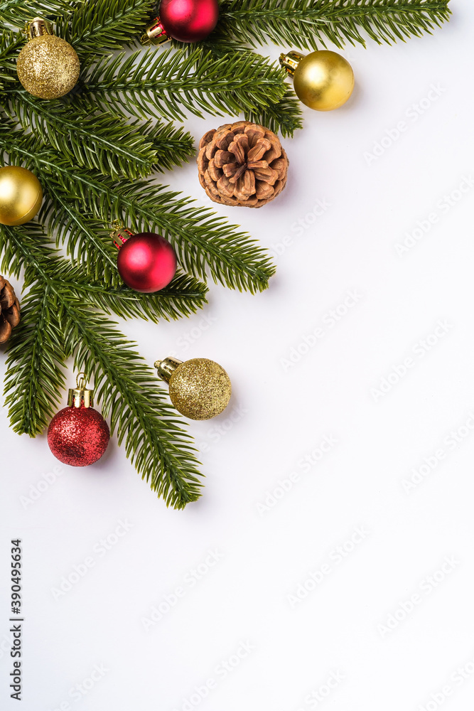 Christmas composition with copy space. Colorful ornament, baubles and fir needles decorations, top view