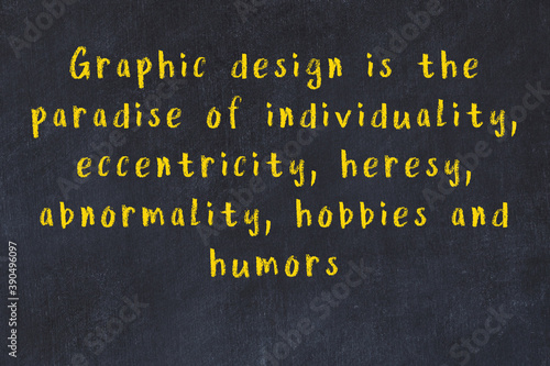 фотографія Chalk inscription of smart quote on black desk