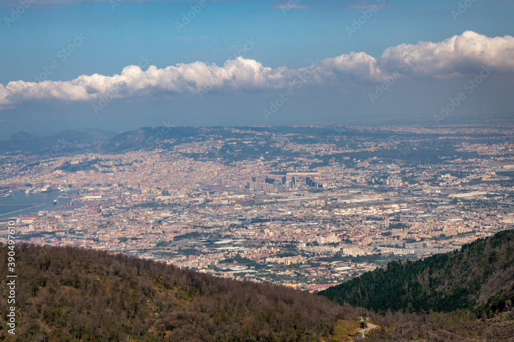 VESUVIUS, ITALY - JULY 12: View of Pompeii from the Vesuvius on July 12 2019. Vesuvius is the only volcano on the European mainland to have erupted within the last hundred years. VESUVIUS, ITALY - JULY 12: View of Pompeii from the Vesuvius on July 12 2019. Vesuvius is the only volcano on the European mainland to have erupted within the last hundred years.