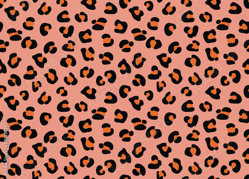 Seamless pattern of leopard texture background elements. Hand-drawn leopard texture in black and pink color on a pink background. Trendy animalistic colorful background for textile, fabric, paper. 
