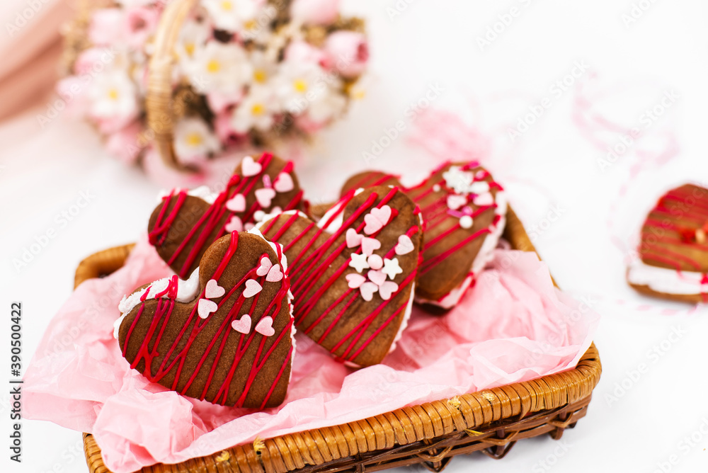 Decorated heart shaped cookies in the box on white background. Decorated heart shaped cookies in the box on white background.