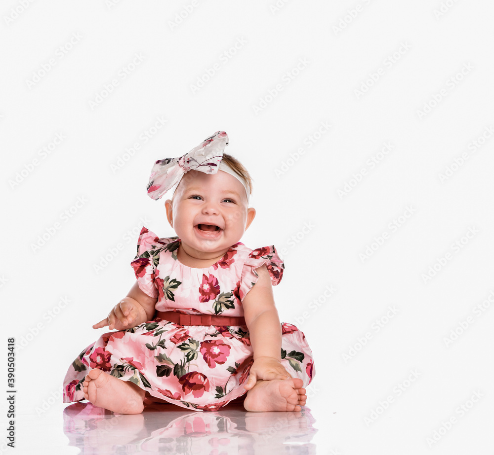 Happy laughing baby girl in festive dress portrait Happy laughing baby girl in festive dress portrait