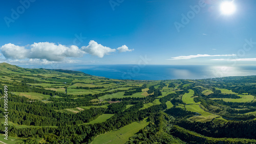 Panoramic view over the luxurious green landscape and the Atlantic ocean, in the North Coast of the island of São Miguel in the Azores.