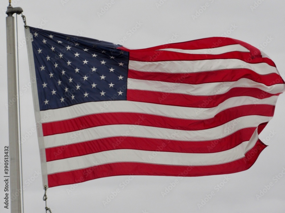 Fototapeta premium american flag waving in wind