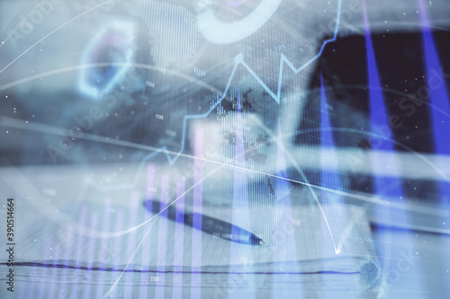 Double exposure of financial graph drawings and desk with open notebook background. Concept of forex market