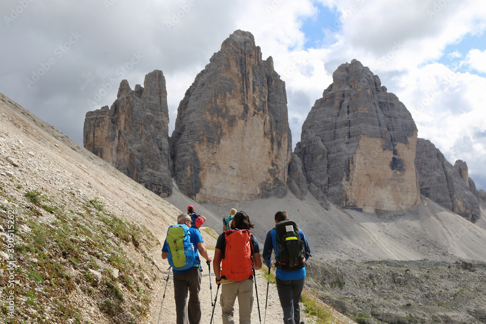 Fototapeta premium group of hikers on the trail in Dolomites