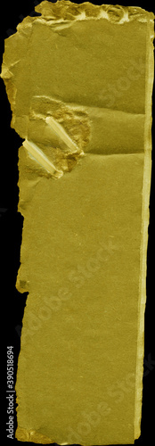 Close up of a yellow vintage torn sheet of carton. Cardboard paper texture with a blank background. Empty papercraft surface. Isolated shape and element.