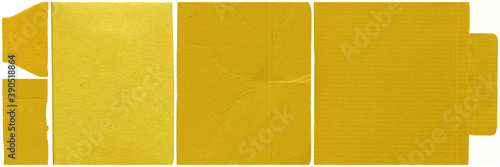Close up of a yellow vintage torn sheet of carton. Cardboard paper texture with a blank background. Empty papercraft surface. Isolated shape and element. photo