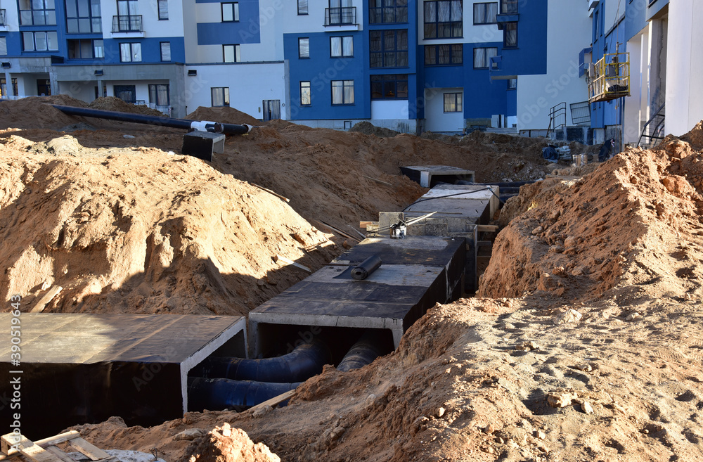 Painting bitumen at concrete wells, сhambers, manholes and pump station ...
