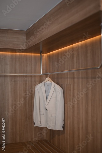 white shirt on hangers